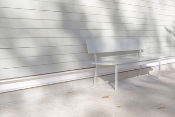 bench against white wall