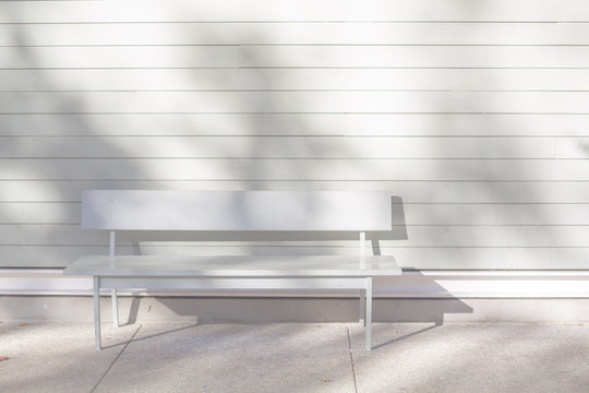bench against white wall