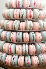 Pyramid of colorful macaroons. Sweets on the holiday. Edible decoration.