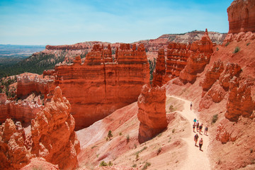 Beautiful Bryce Canyon National Park in Utah, USA. Orange rocks, blue sky. Giant natural amphitheaters and hoodoos formations. Great panoramic views from vista points and breathtaking adventure.