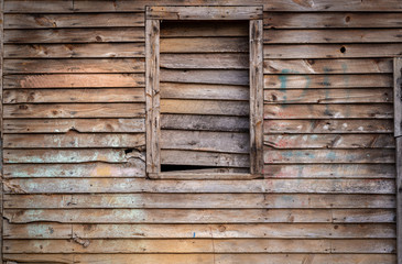 Unpainted boards on side of old building in central Virginia.