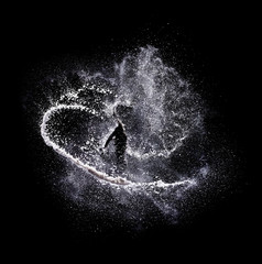 White solt powder explosion, flying pepper on black background, Freeze motion photo