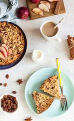 Oatmeal cake or baked oatmeal with apples and raisin. Dietary autumn pastries, healthy breakfast. 