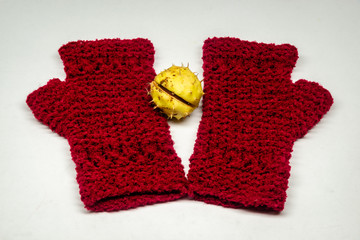 Knitted finger-less on the white background 