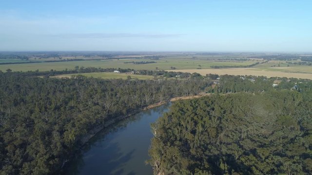 Flight along Murray River at sunset in Victoria, Australia