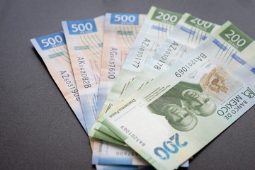 mexican pesos tickets new bills two hundred on black table