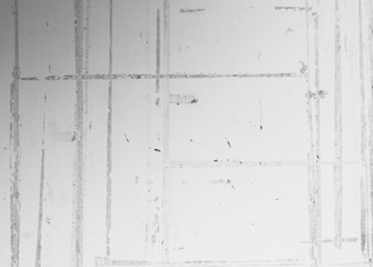 Tape residue on white wall