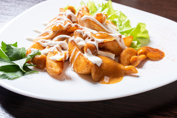 fried potatoes with honey mushrooms and herbs.