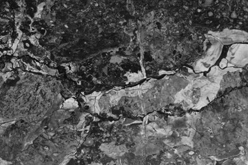 Black dark marble granite texture background closeup. Grunge stone surface