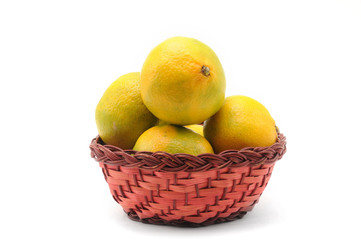 Yellow-green tangerines on a white background