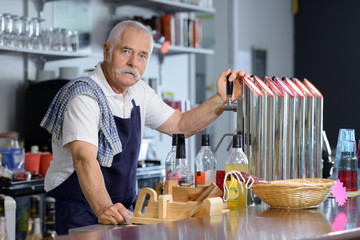 portrait of a senior barman
