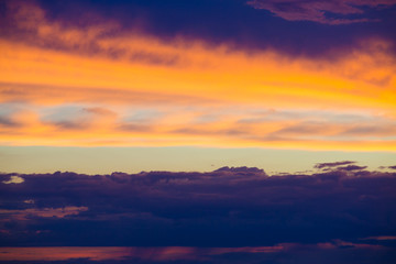 Abstract beautiful sunrise and dramatic clouds on the sky.