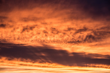 Abstract beautiful sunrise and dramatic clouds on the sky.