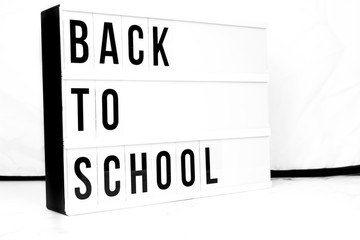 Back to School displayed on a vintage retro Lightbox. Concept image