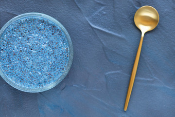 Blue spirulina chia seed pudding bowl. Superfood and vegan concept.