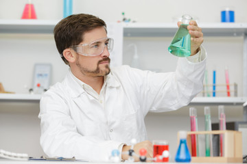 Fototapeta premium a male worker reseacher in a laboratory