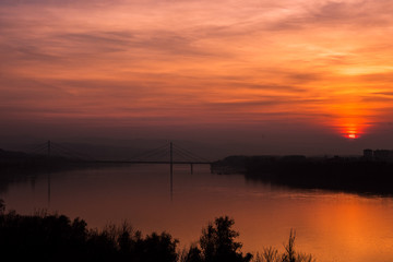 Fototapeta na wymiar sunset over river 