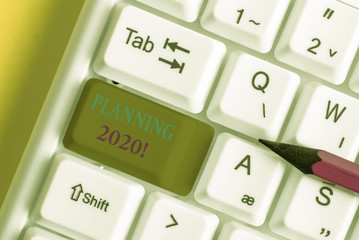 Conceptual hand writing showing Planning 2020. Concept meaning process of making plans for...