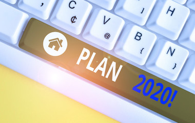 Writing note showing Plan 2020. Business concept for detailed proposal doing achieving something...