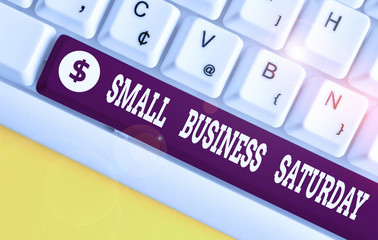 Handwriting text Small Business Saturday. Conceptual photo American shopping holiday held during the Saturday White pc keyboard with empty note paper above white background key copy space