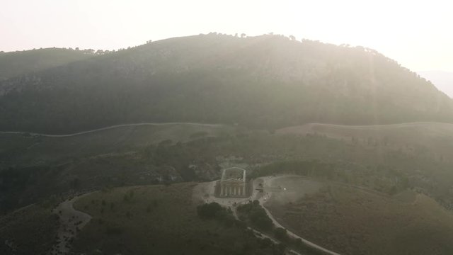 Aerial view of ancient temple standing on the high hill in Athens in Greece. Action. Temple of Olympian is also known as the Columns of the Olympian Zeus.