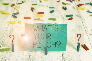 Handwriting text What S Is Your Pitch question. Conceptual photo asking about property of sound or music tone Scribbled and crumbling sheet with paper clips placed on the wooden table