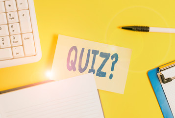 Word writing text Quiz Question. Business photo showcasing test of knowledge as competition between individuals or teams Empty orange paper with copy space on the yellow table