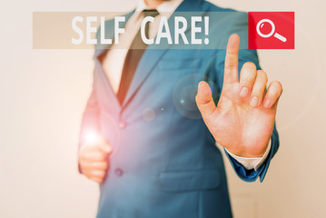 Conceptual hand writing showing Self Care. Concept meaning practice of taking action to preserve or improve ones own health Businessman with pointing finger in front of him