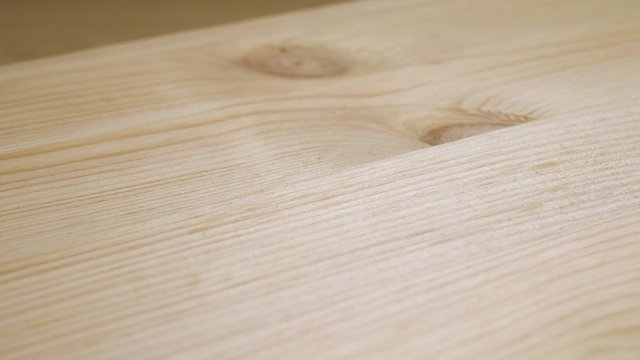 Lumber or timber processed into beam or plank. Wood production concept. Lumber for used for structural purposes. Wooden plank surface as texture background after cutting in sawmill