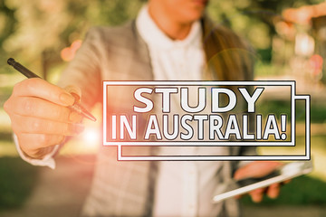 Conceptual hand writing showing Study In Australia. Concept meaning going into foreign country...