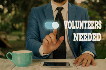 Conceptual hand writing showing Volunteers Needed. Concept meaning need work or help for...