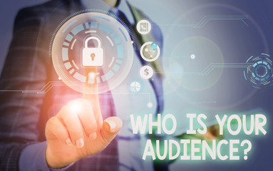 Handwriting text Who Is Your Audience Question. Conceptual photo who is watching or listening to it Woman wear formal work suit present presentation using smart latest device