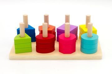 Wooden educational toy set for children on a white background. 