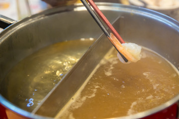 shrimp in sukiyaki pot boiled and steam, choose boiled food for healthy and avoid fried food and grilled food is concept. Selective focus Shabu Shabu and Sukiyaki, Japanese food