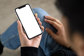 Hand holding phone for app mockup