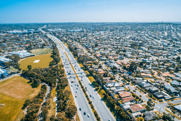Cars driving on Monash Freeway at Wheelers Hill suburb in Melbourne, Australia - aerial view