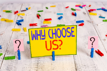 Text sign showing Why Choose Us Question. Business photo text list of advantages and disadvantages to select product service Scribbled and crumbling sheet with paper clips placed on the wooden table