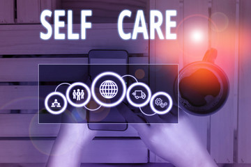 Text sign showing Self Care. Business photo showcasing the practice of taking action to improve one...