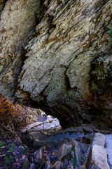 Trail Sneaks Under Large Boulder