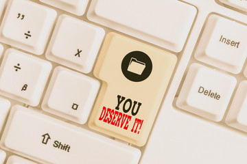 Text sign showing You Deserve It. Business photo showcasing should have it because of their...