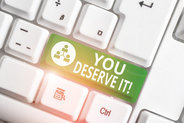 Writing note showing You Deserve It. Business concept for should have it because of their qualities...