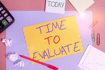 Word writing text Time To Evaluate. Business photo showcasing judge something with respect to its worth or significance Striped paperboard notebook cardboard office study supplies chart paper