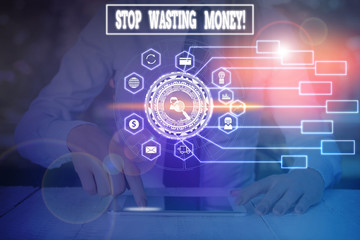 Writing note showing Stop Wasting Money. Business concept for advicing demonstrating or group to start saving and use it wisely Woman wear formal work suit present using smart latest device