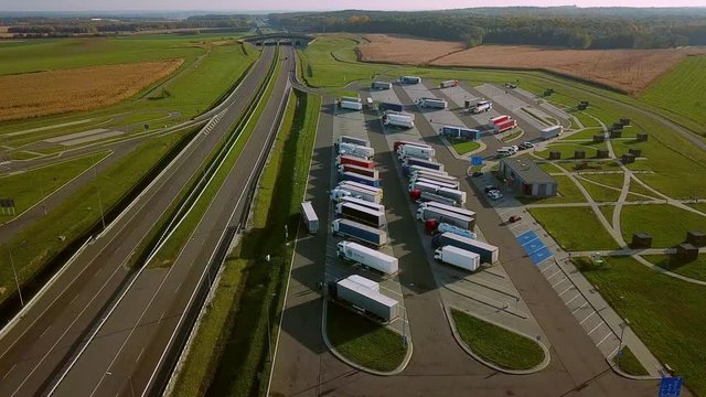 Aerial View Truck Stop Of Highway Rest Area With Restaurant And Large Car Park For Cars And Trucks. Poland European Union. Ver 3