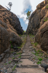 Fototapeta na wymiar Decsending path to Harinareshwar Rocky beach,Maharashtra,India