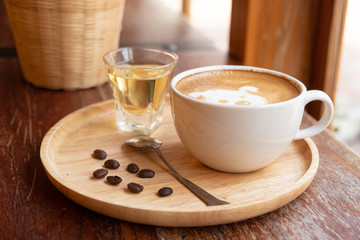 Latte art in a white glass