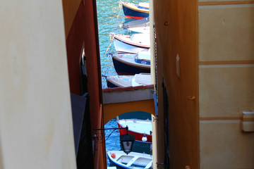 Obraz na płótnie Canvas The boats between the houses