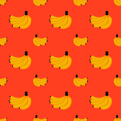 Seamless banana pattern on orange background.