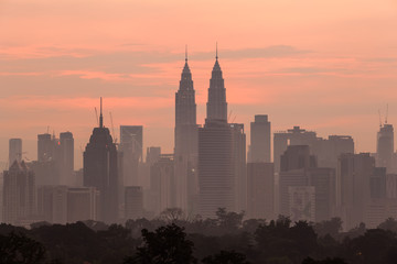 beautiful sunrise over kuala lumpur city skyline