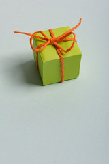 christmas presents nicely decorated with bows and feathers. view from above.